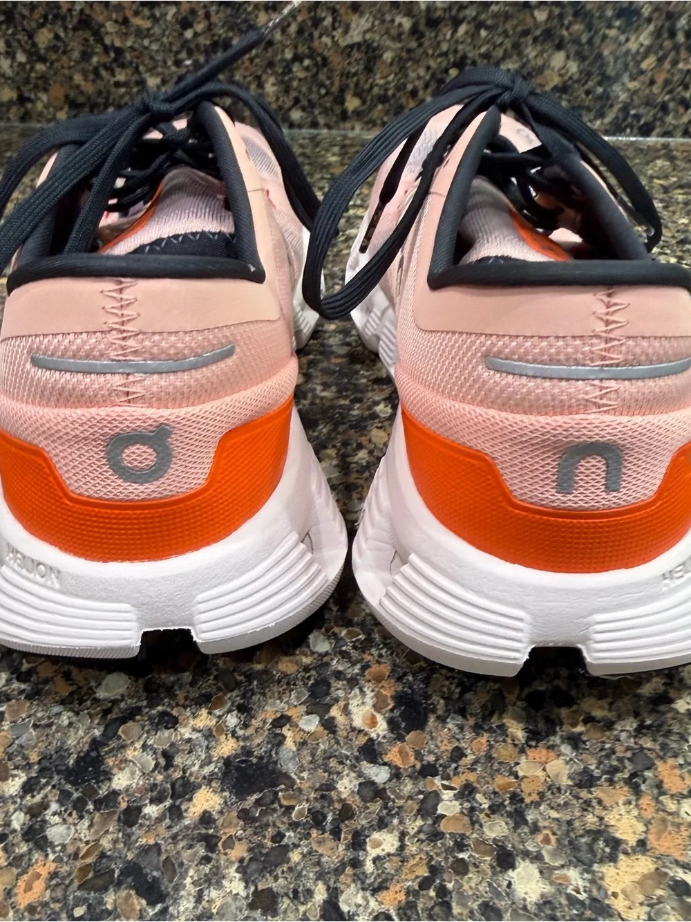 On Cloud Running Shoes in white with Orange Accent ladies 9